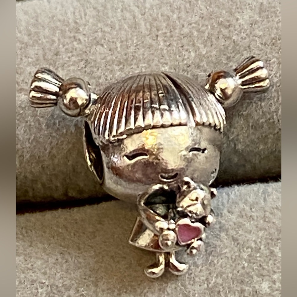 💯% Authentic Pandora little girl enamel pigtails charm